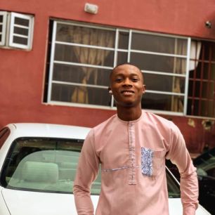 Dist. Comrade Udom Joshua Sunday